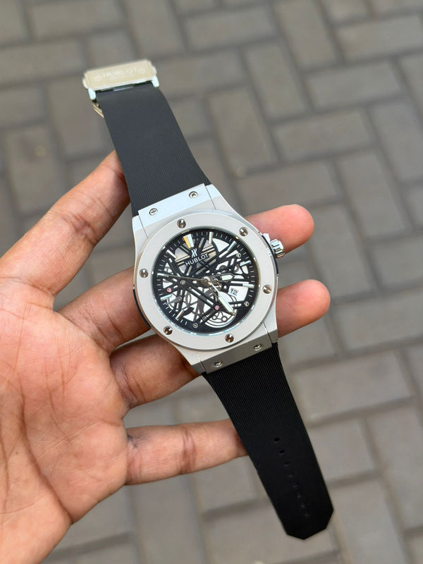 Hublot Big Bang black case skeleton chronograph watch with blue rubber strap