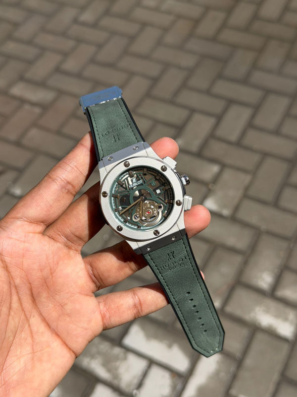 Hublot Big Bang black case skeleton dial watch with blue leather strap