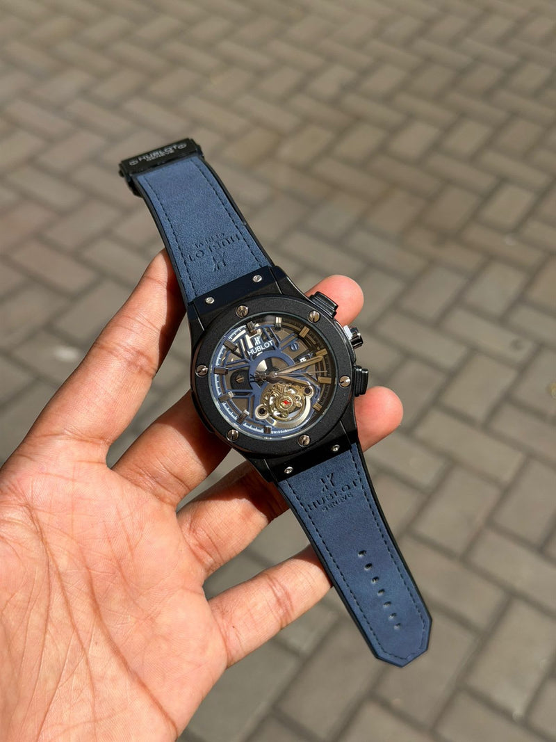 Tissot automatic black skeleton dial watch with black leather strap